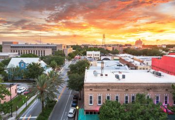 Gainesville, Florida, USA downtown cityscape at dusk.